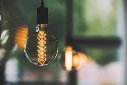 Modern Hanging Lightbulbs hanging in a newly moved into home
