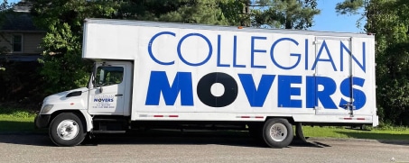Parked Collegian Movers truck