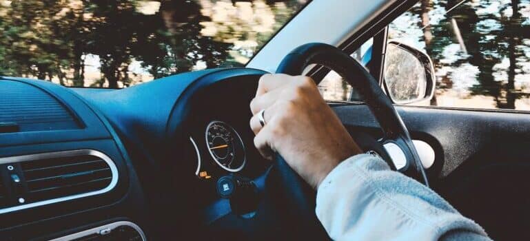 person driving a car