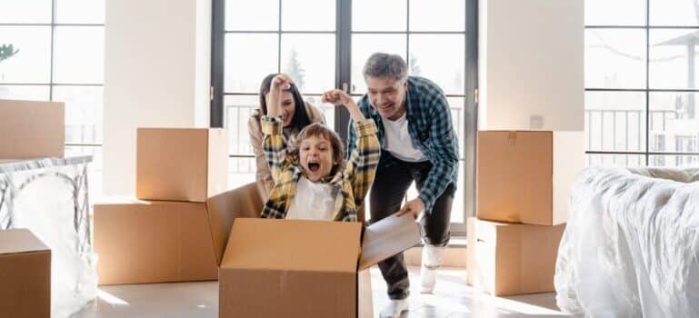 A family having fun while unpacking