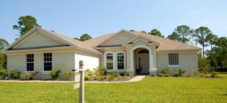 a house with grass front yard