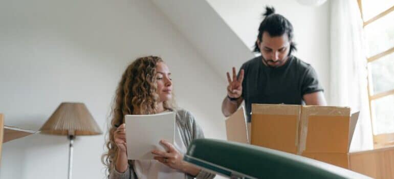 Focused couple packing for a Damage-Free Move to New Haven CT