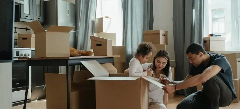 A family waiting for movers and packers CT offers
