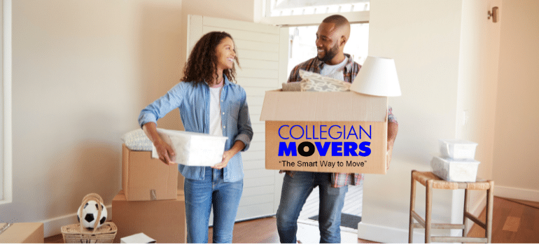 A happy couple unpacks boxes in their new Milford apartment. Moved in just hours after calling Collegian Movers for same-day service.