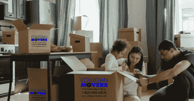 A family waiting for movers and packers CT to arrive while labeling moving boxes