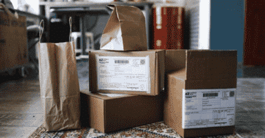 Pile of boxes packed and ready to be moved.